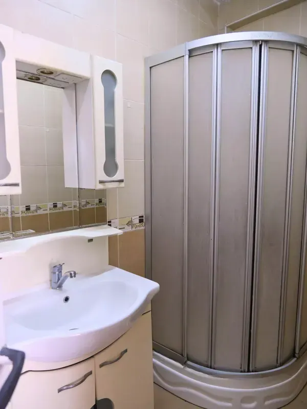 Modern internal bathroom with shower with new furniture and clean in Fatih residence